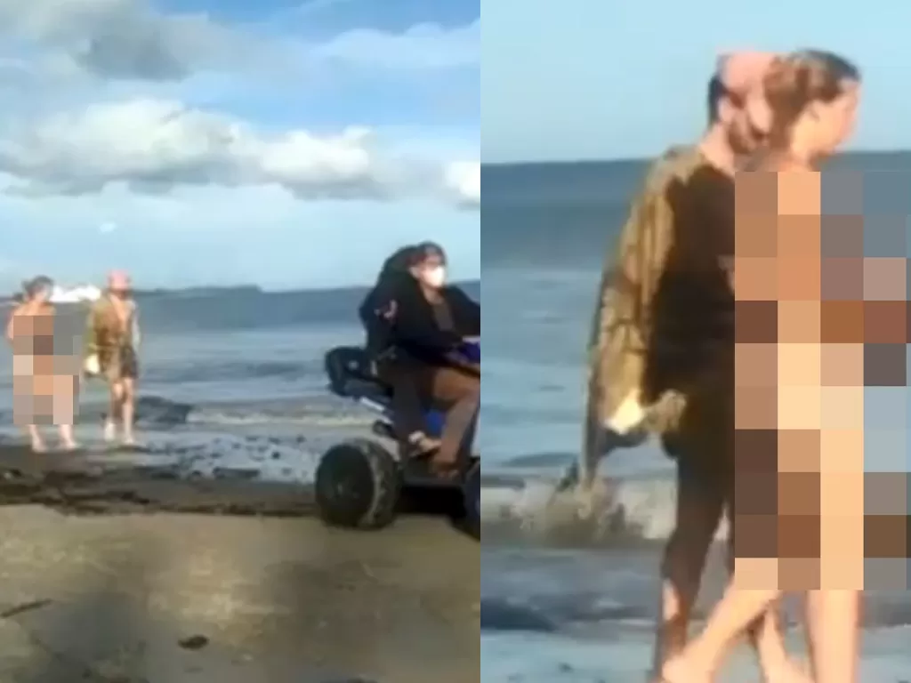 Pasangan turis berbikini di Pantai Aceh Singkil (Facebook/Kabar Subulussalam)