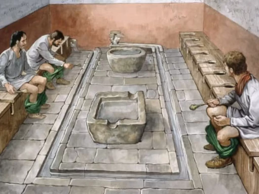 Ilustrasi orang Romawi yang sedang membersihkan gigi mereka dengan air kencing. (Wikimedia Commons)