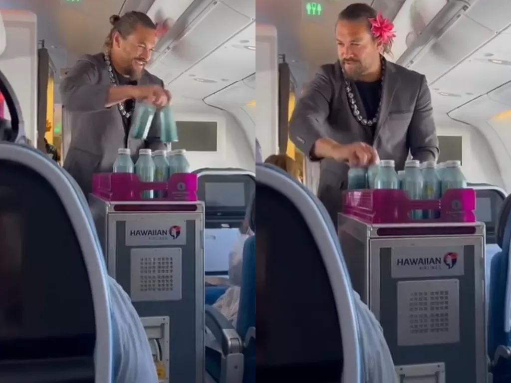 Jason Momoa mendadak jadi pramugara dan bagikan air minum ke penumpang pesawat Hawaiian Airlines. (tiktok/@livinglikekylee)