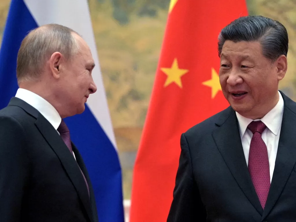 Presiden China Xi Jinping dan Presiden Rusia Vladimir Putin (REUTERS/Sputnik/Aleksey Druzhinin/Kremlin)
