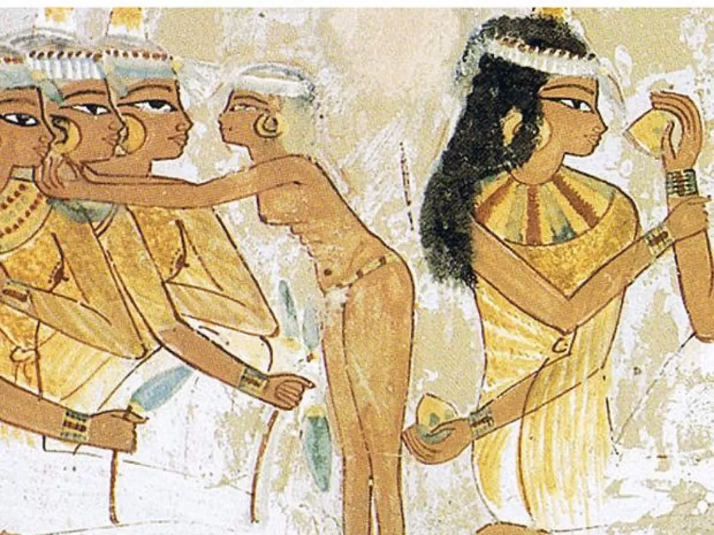 Ilustrasi wanita zaman kuno menggunakan lipstik. (Wikipedia)