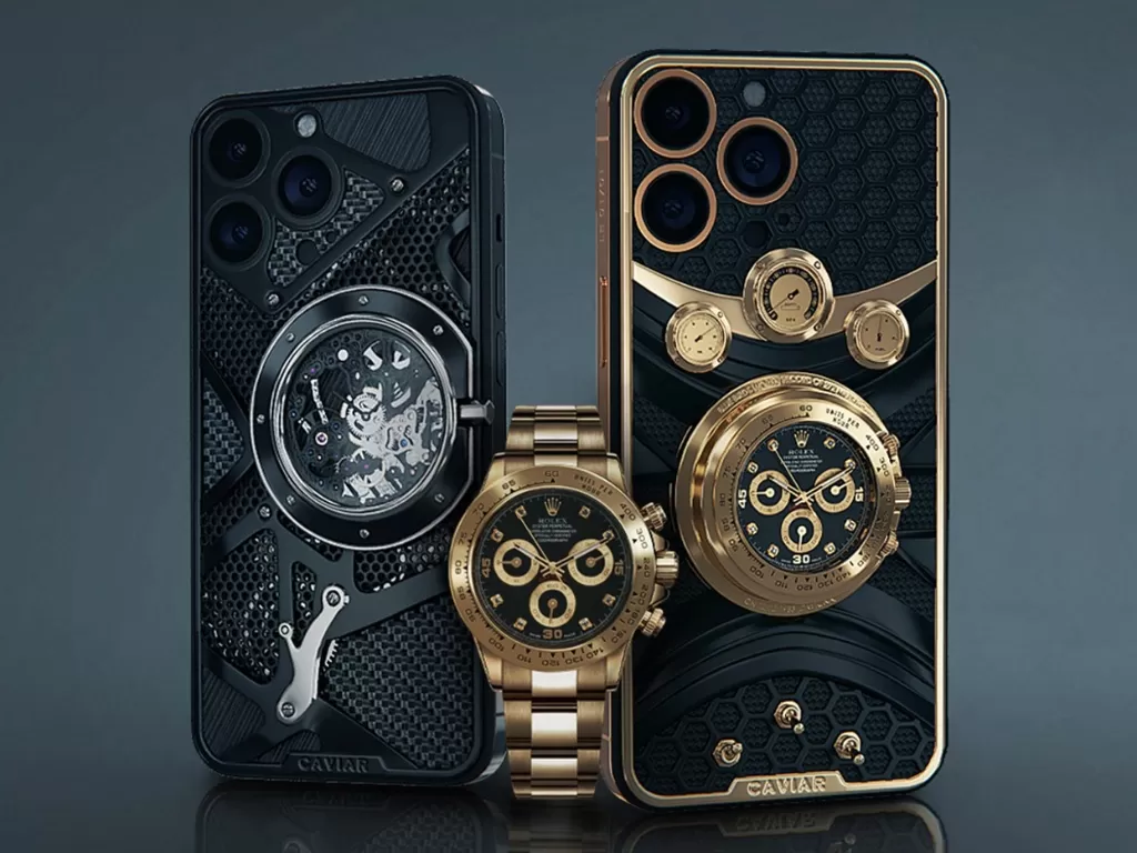 Caviar iPhone 14 Pro dan Pro Max yang tersemat jam tangan Rolex dibelakangnya. (Caviar)