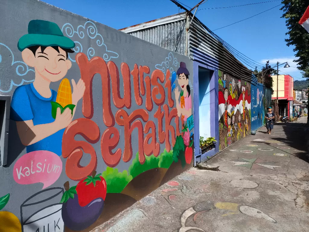 Gang sempit disulap jadi penuh mural. (Z Creators/Hasan Syamsuri)