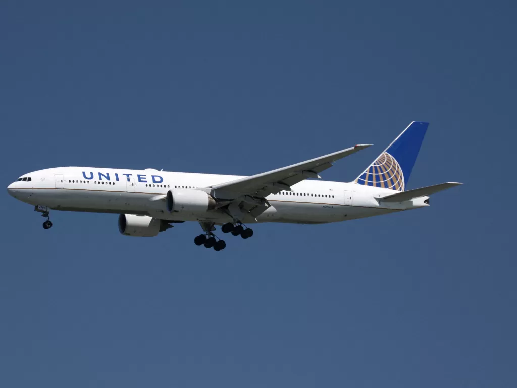 Pesawat United Airlines. (REUTERS/Louis Nastro)