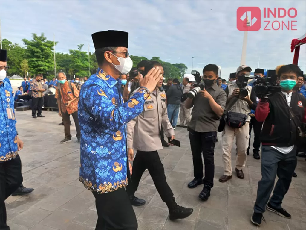 Pj Gubernur DKI Jakarta, Heru Budi Hartono, saat menghadiri Upacara Sumpah Pemuda di Monas (INDOZONE/Febyora Dwi Rahmayani)