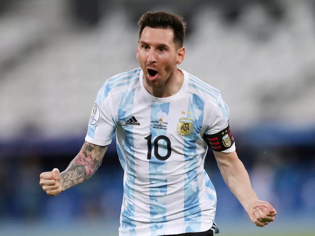 Kapten Timnas Argentina, Lionel Messi, melakukan selebrasi (REUTERS/Ricardo Moraes)