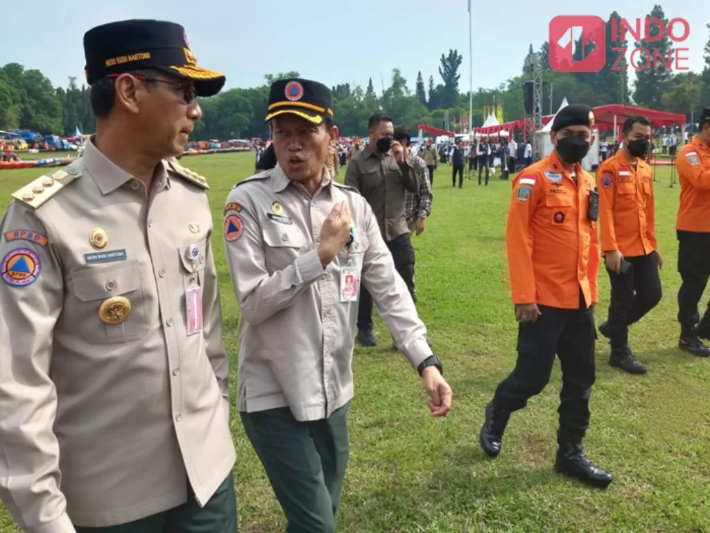 Penjabat (Pj) Gubernur DKI Jakarta Heru Budi Hartono (kiri). (INDOZONE/Febyora Dwi Rahmayani)