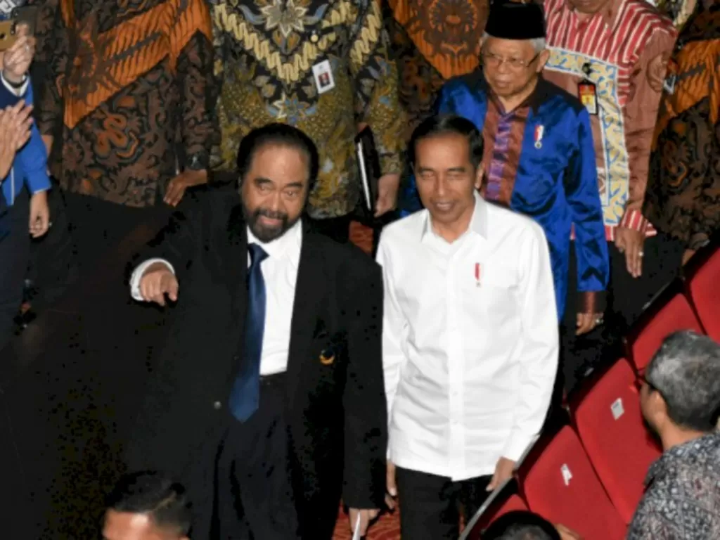 Presiden Presiden Jokowi dan Surya Paloh (photo: ANTARA/Indrianto Eko Suwarso)