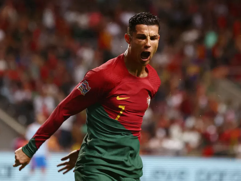 Cristiano Ronaldo melakukan selebrasi (REUTERS/Pedro Nunes)
