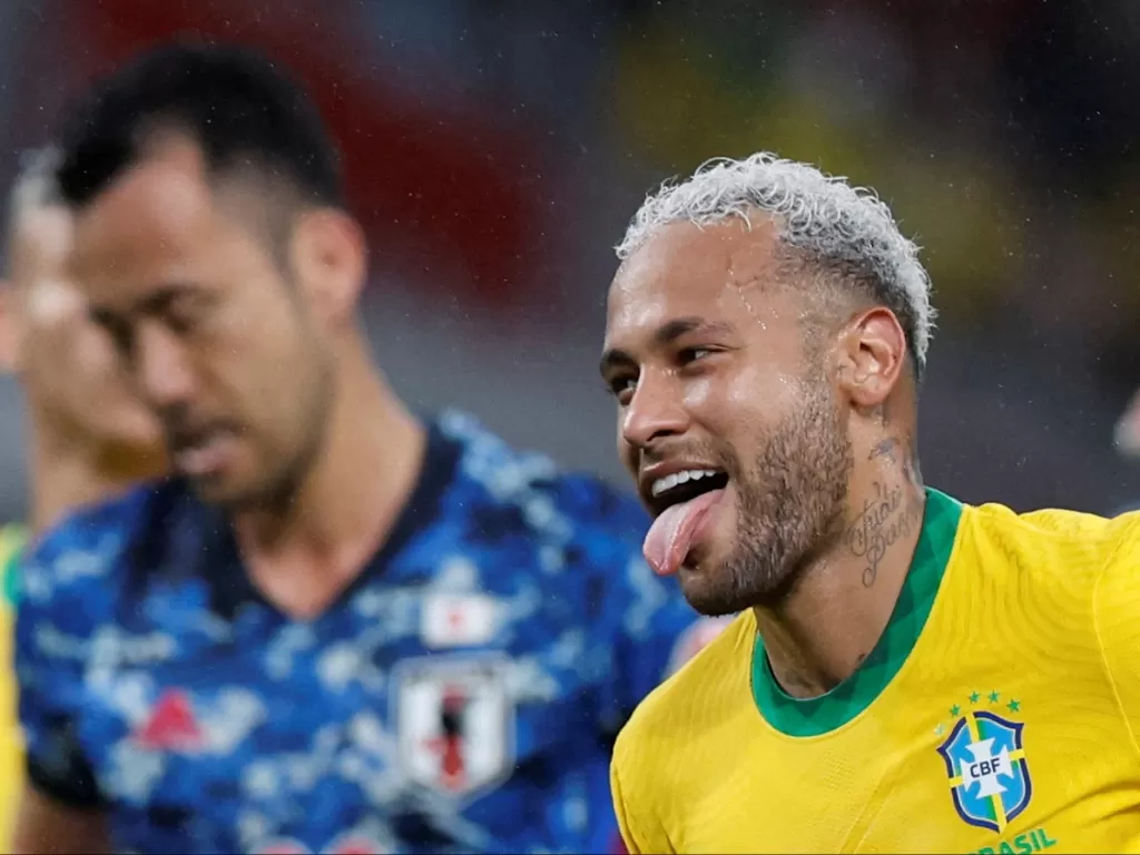 Neymar Jr merayakan golnya (Reuters/Issei Kato)