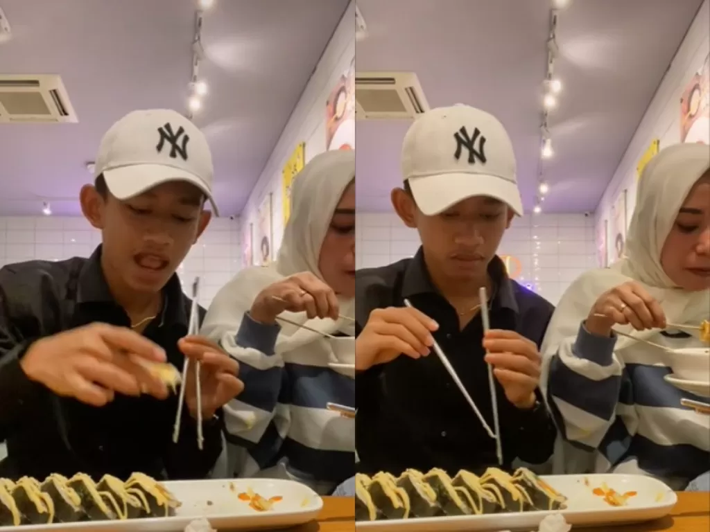 Aksi pria yang comot sushi pakai tangan lantaran tak pandai memakai sumpit. (TikTok/awill1307)