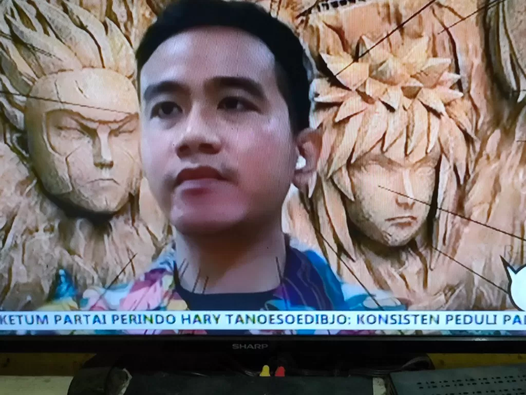 Gibran Rakabuming pakai background Naruto saat wawancara di TV (Twitter/vulnuspunctum)