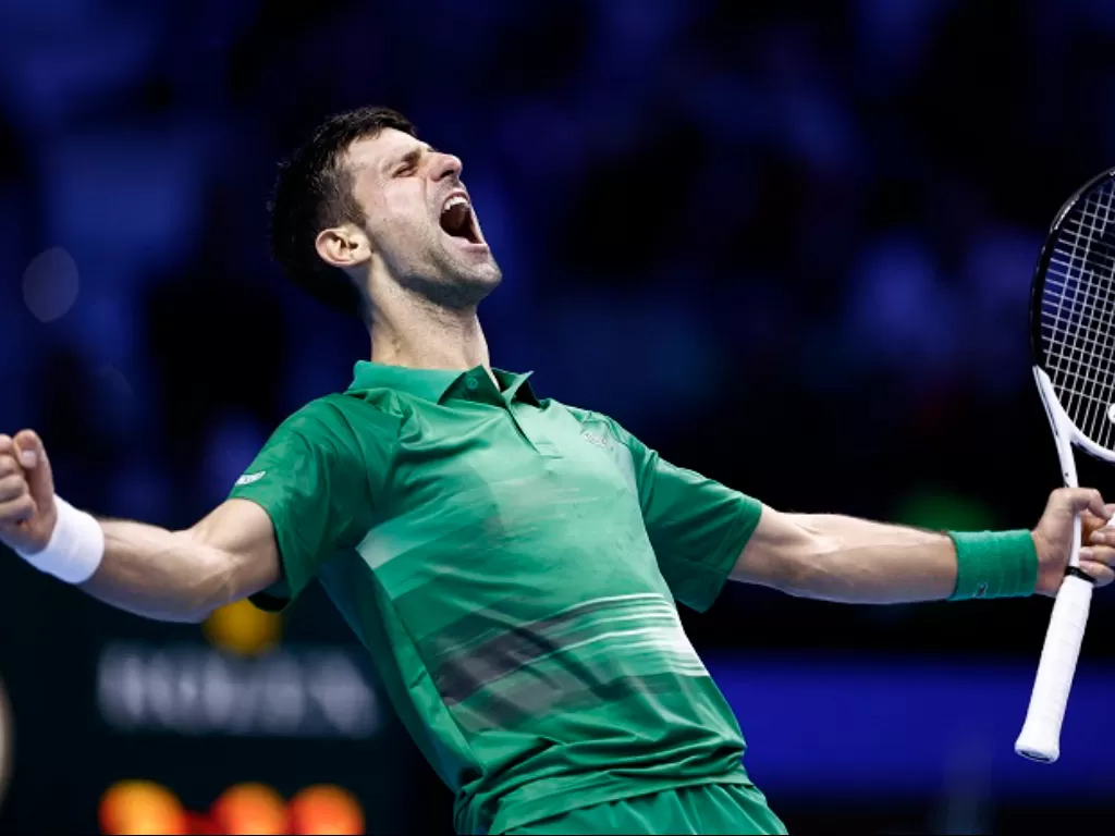 Petenis asal Serbia Novak Djokovic tampil sempurna di ATP Finals 2022. (REUTERS/Guglielmo Mangiapane)