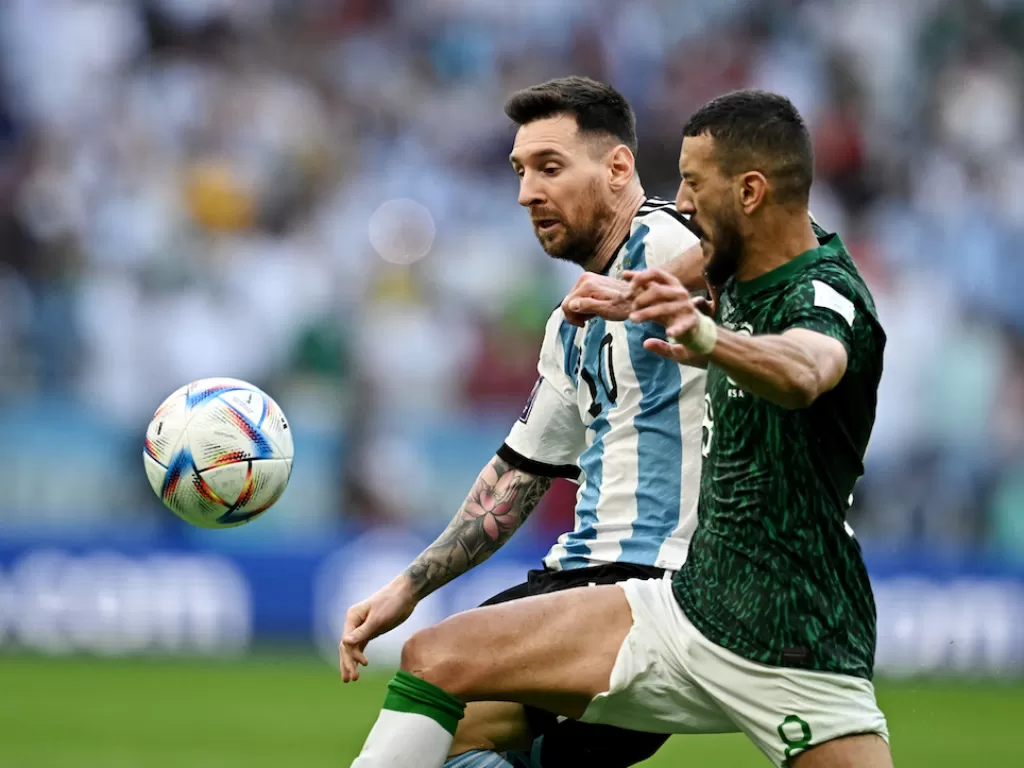 Lionel Messi bersama Timnas Argentina tumbang dari Timnas Arab Saudi di Piala Dunia 2022 (REUTERS/Dylan Martinez)