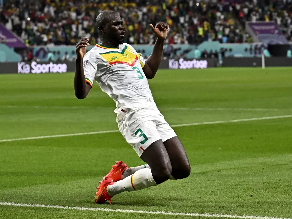 Kalidou Koulibal merayakan gol kedua melawan Ekuador di Piala Dunia 2022 (REUTERS/Dylan Martinez)