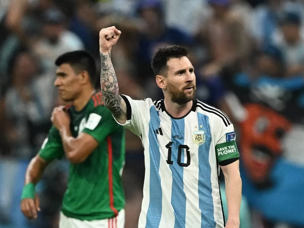 Lionel Messi merayakan golnya (Reuters/Dylan Martinez)
