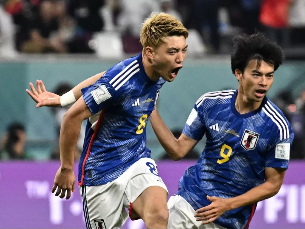 Ritsu Doan (kiri) berselebrasi usai cetak gol untuk Timnas Jepang (REUTERS/Dylan Martinez)