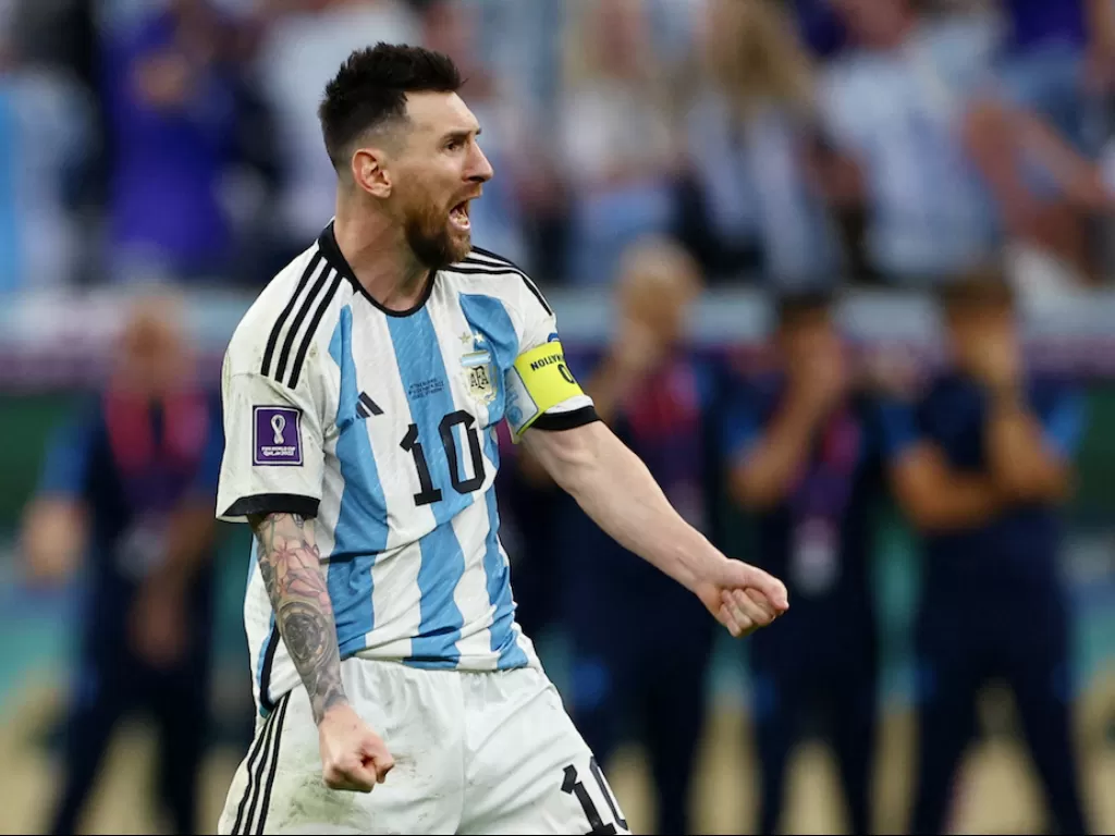 Kapten Timnas Argentina, Lionel Messi, melakukan selebrasi (REUTERS/Molly Darlington)