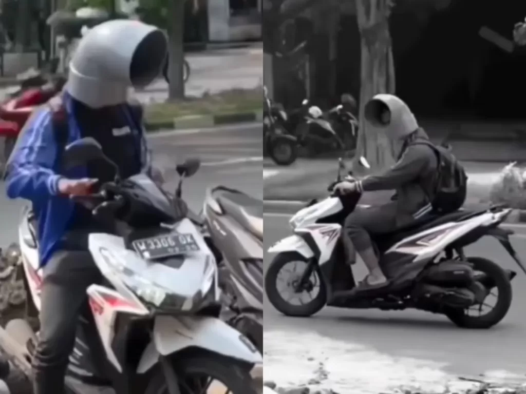 Aksi kocak pria yang gunakan penyambung pipa sebagai helm lantaran tak dikasi kantongan plastik. (Instagram/kepoin_trending)