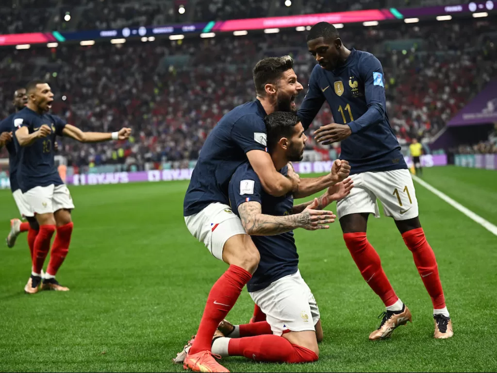 Pemain Timnas Prancis melakukan selebrasi (REUTERS/Dylan Martinez)
