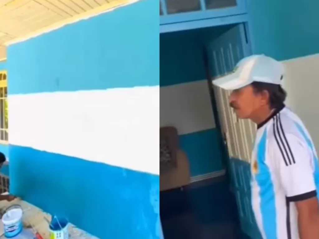 Aksi bapak yang cat rumah bertemakan bendera Argentina. (Instagram/kepoin_trending)