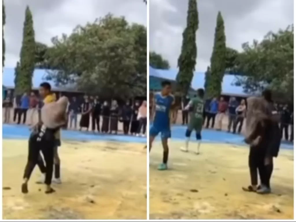 Seorang wanita nekat terobos lapangan futsal usai lihat pemain yang diduga kekasihnya kena tekel lawan. (Screenshoot/Instagram/@coach_jhones)