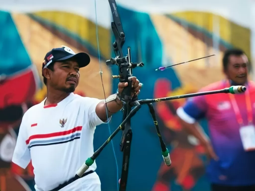 Udin, mantan atlet peraih emas Asean Para Games jualan bubur ayam. (Dok. Pribadi)