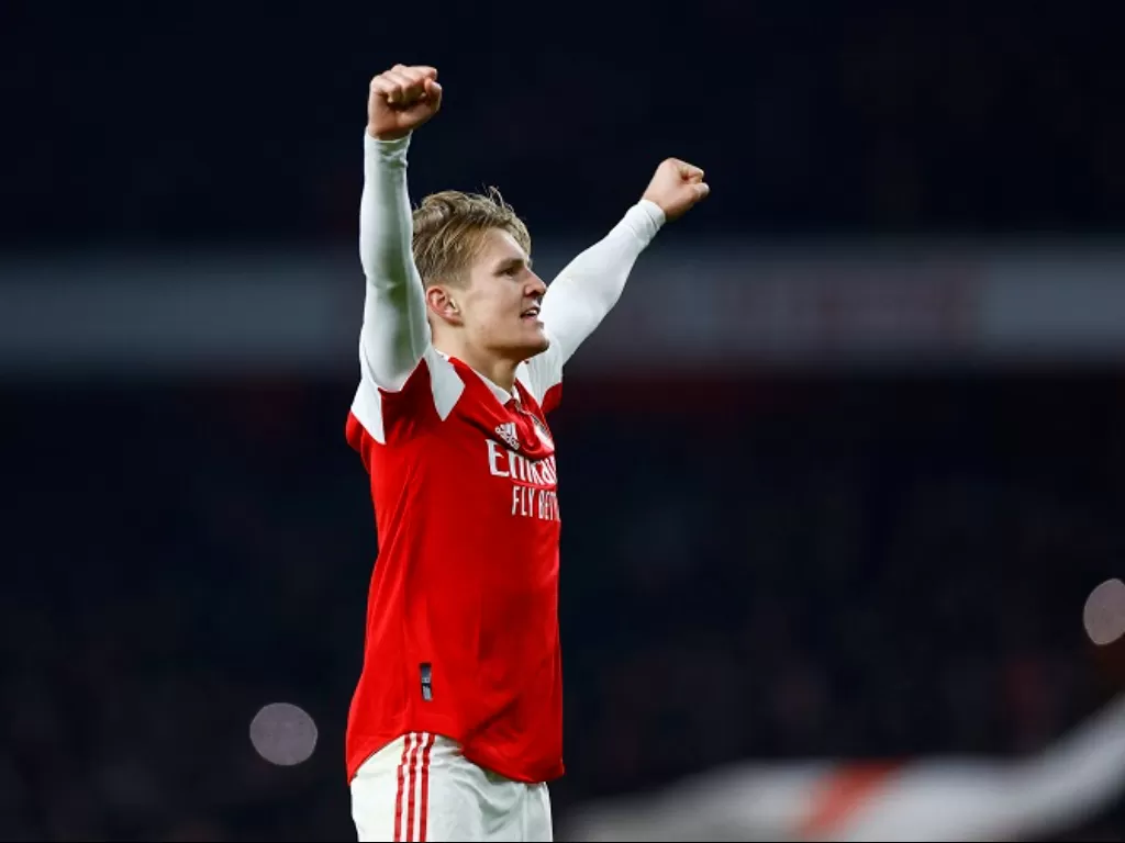 Bintang dan kapten Arsenal, Martin Odegaard. (REUTERS/Peter Cziborra)