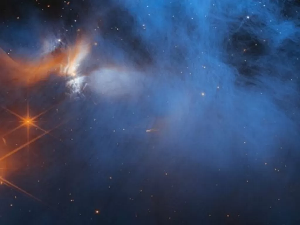 Gambar dari wilayah tengah awan molekul gelap Chameleon I, yang berjarak 630 tahun cahaya (NASA/ESA/CSA/M. Zamani (ESA/Webb)/M. K. McClure (Leiden Observatory)/F. Sun (Steward Observatory)/Z. Smith (Open University)/Ice Age ERS Team)