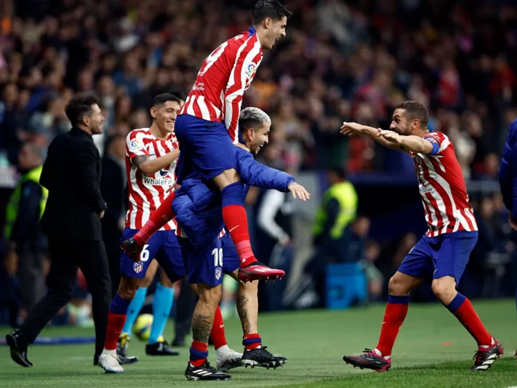 Pemain Atletico Madrid merayakan gol ke gawang Getafe dalam lanjutan Liga Spanyol 2022/2023. (REUTERS/Juan Medin)