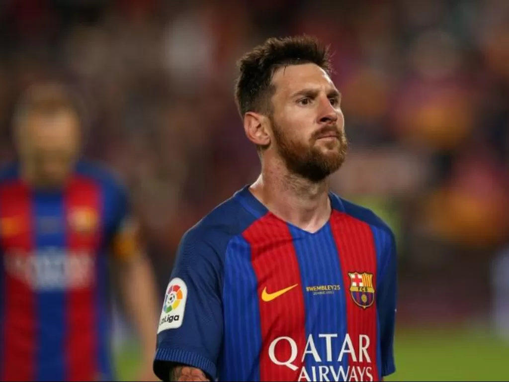 Lionel Messi saat memperkuat Barcelona (REUTERS/Albert Gea)