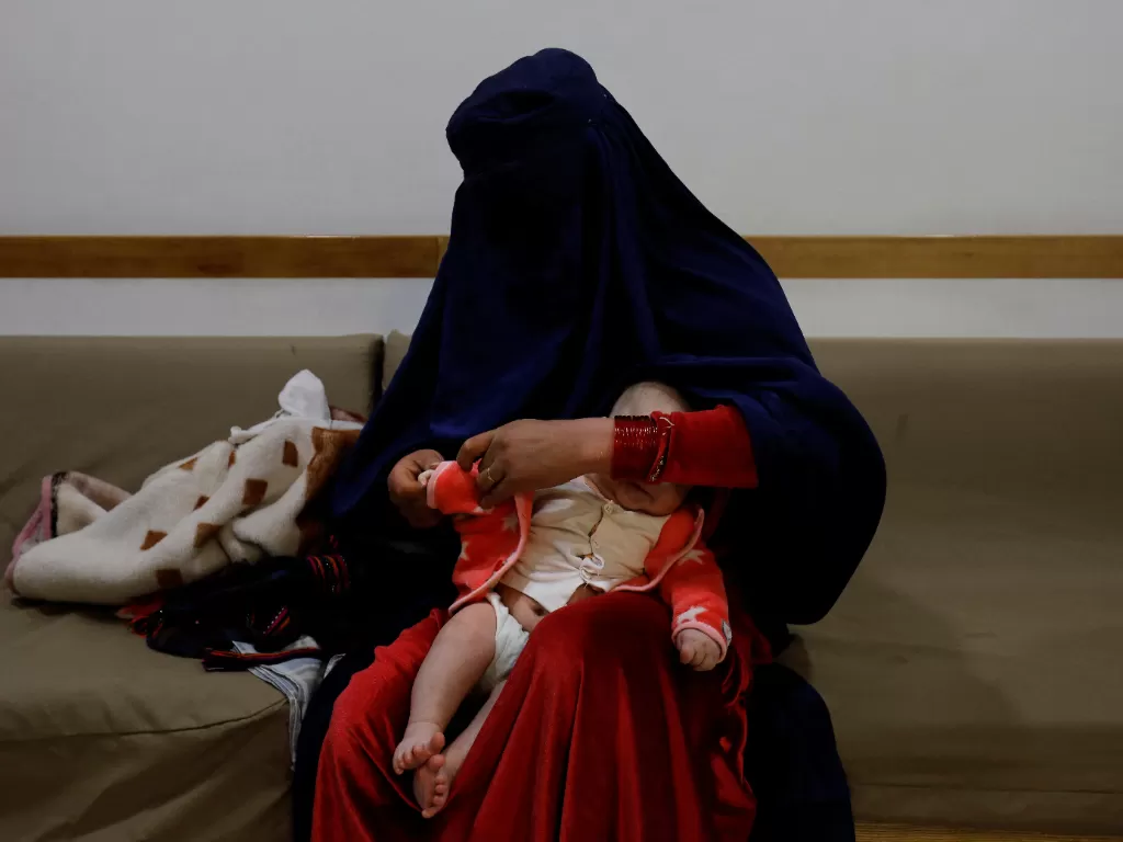 Taliban paksa wanita Afghanistan yang sudah bercerai kembali ke suaminya yang kejam. Ilustrasi wanita Afghanistan. Ilustrasi wanita Afghanistan. (REUTERS Ali Khara)