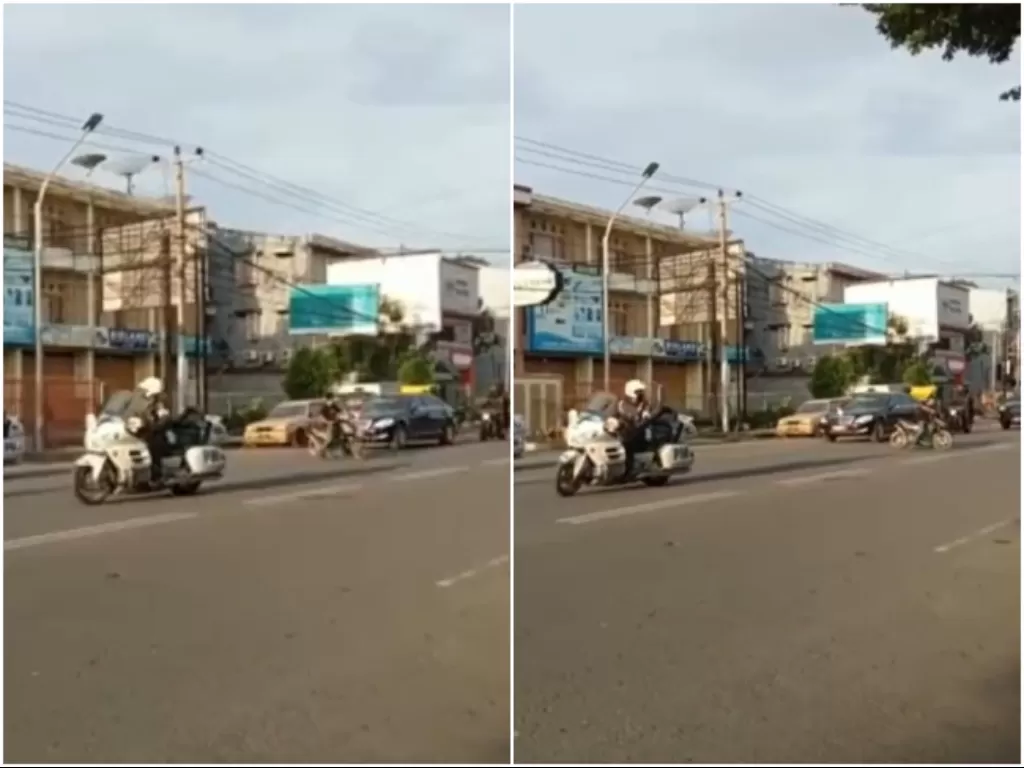 Pemotor potong jalan mobil Presiden Jokowi. (Twitter/@Daeng_Info)