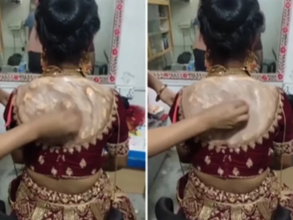 Pengantin wanita dimakeupin punggungnya oleh MUA. (Screenshoot/Instagram/@pagikucerahku.mood)