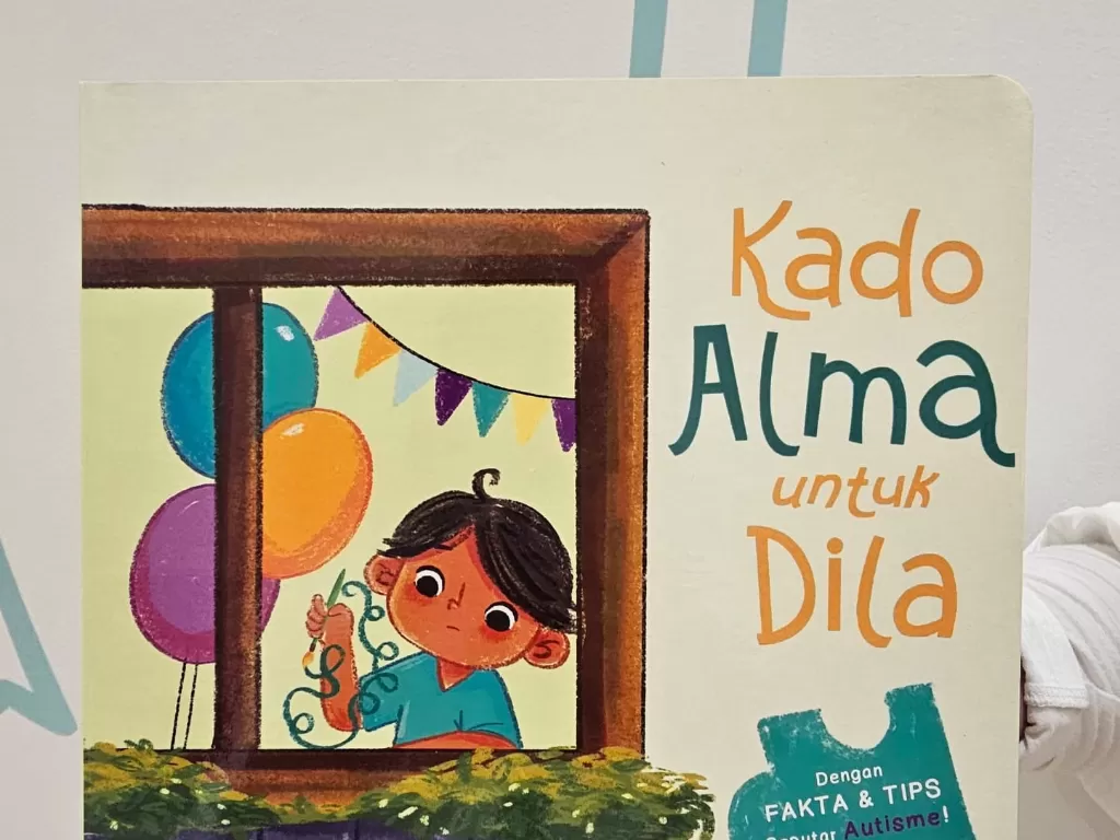 Buku cerita bergambar tentang autisme, ‘Kado Alma untuk Dila’. (Dok Drisana)