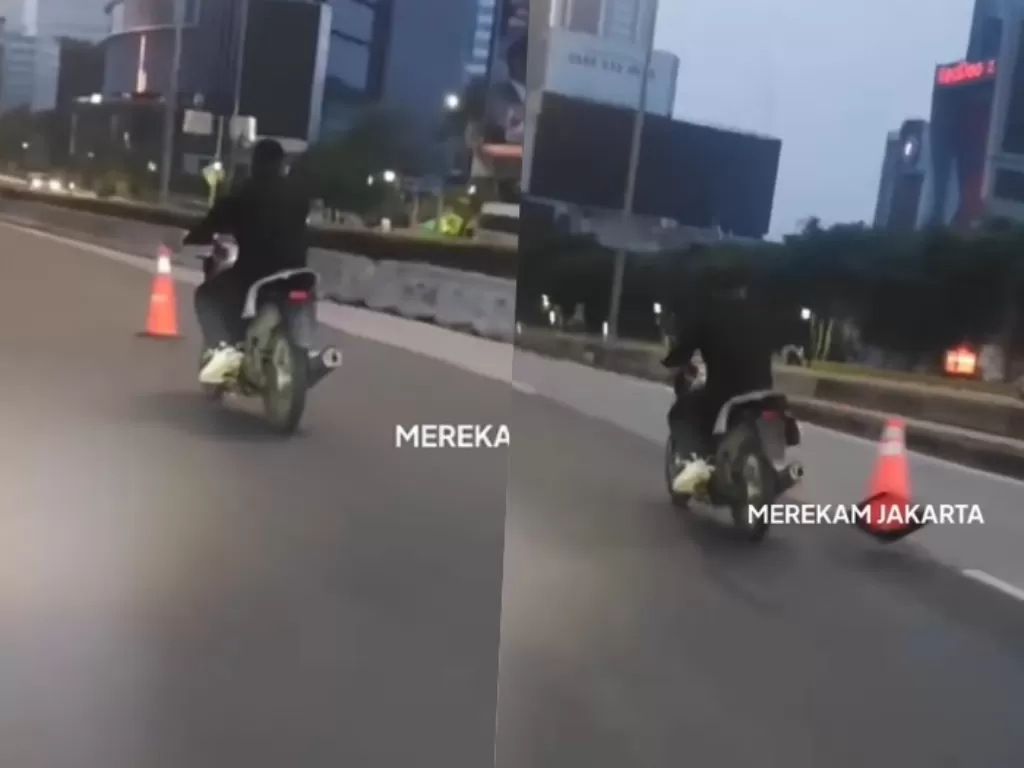 Viral aksi pemotor tendang cone di Sudirman, Jakarta. (Instagram/merekamjakarta).