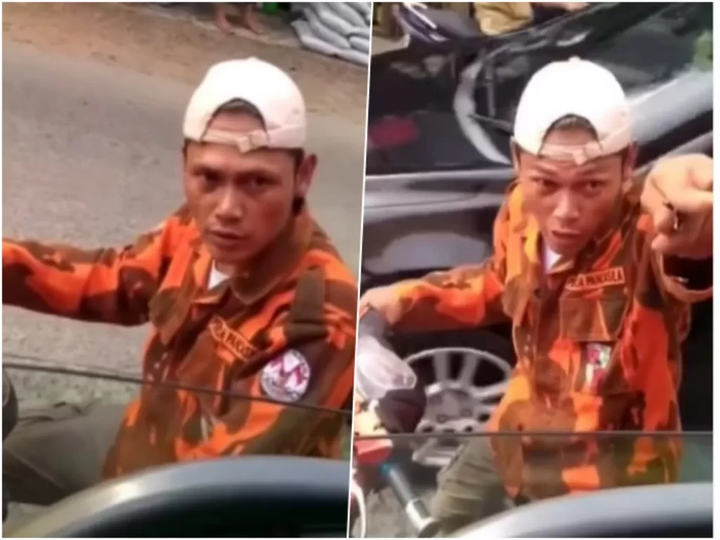 Video viral pria pemalak supir truk di Bogor berseragam ormas. (Instagram/fakta.indo)