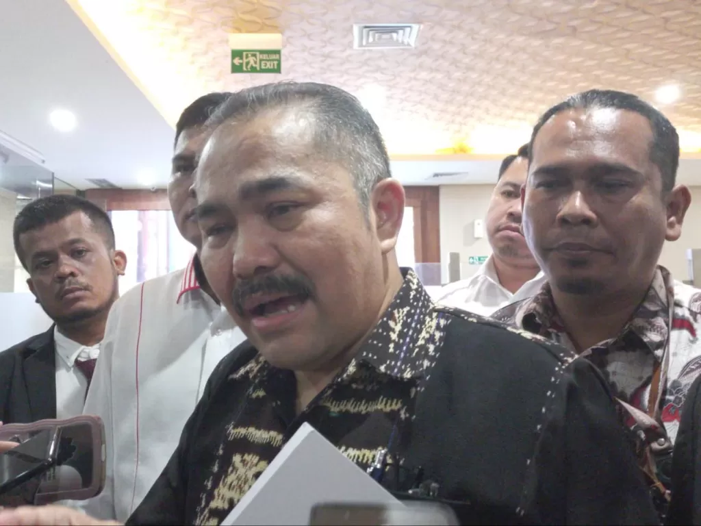Pengacara keluarga Bripka Arfan Saragih, Kamaruddin Simanjuntak di Gedung Bareskrim Mabes Polri, Jakarta. (INDOZONE/Samsudhuha Wildansyah).