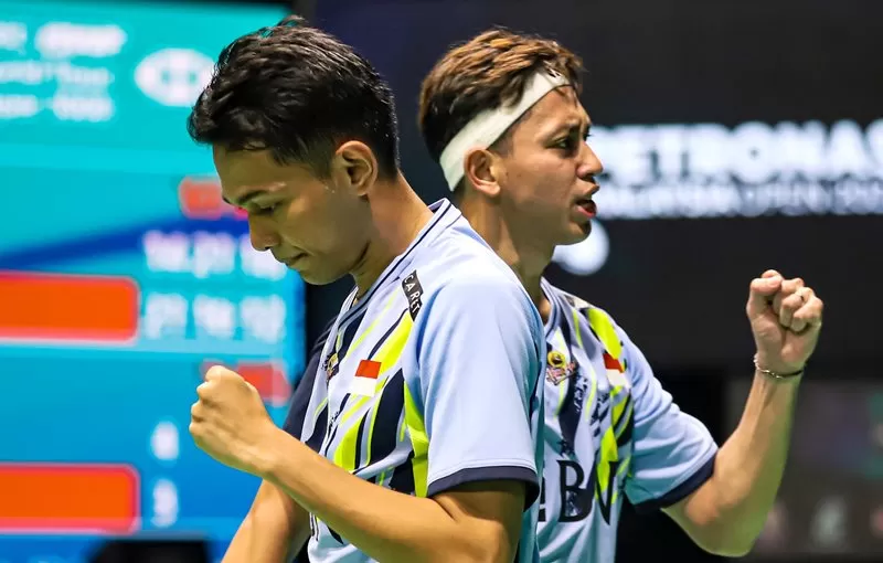 Fajar Alfian dan Muhammad Rian Ardianto di Malaysia Open 2023. (Foto: Twitter @Badminton Talk)