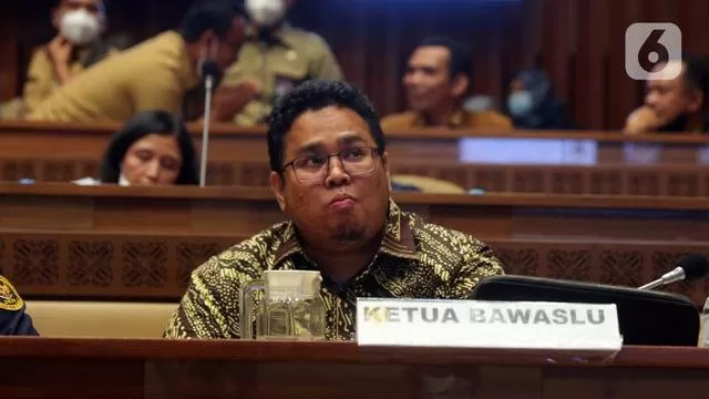 Ketua Bawaslu Rahmat Bagja saat rapat kerja dengan Komisi II DPR RI di Kompleks Parlemen, Senayan, Jakarta, Selasa (7/6/2022). Rapat membahas Peraturan KPU (PKPU) tentang Tahapan dan Jadwal Pemilu 2024. (Liputa6.com/Angga Yuniar)
