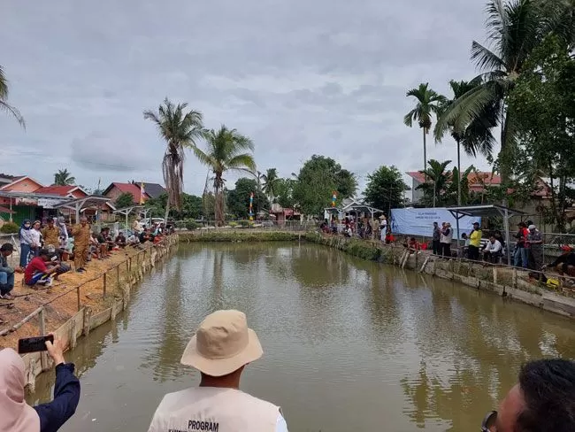 Suasana di Kolam Pemancingan Liposos 1 Rt 15 Kampung Wisata Berseri Kelurahan Ekajaya