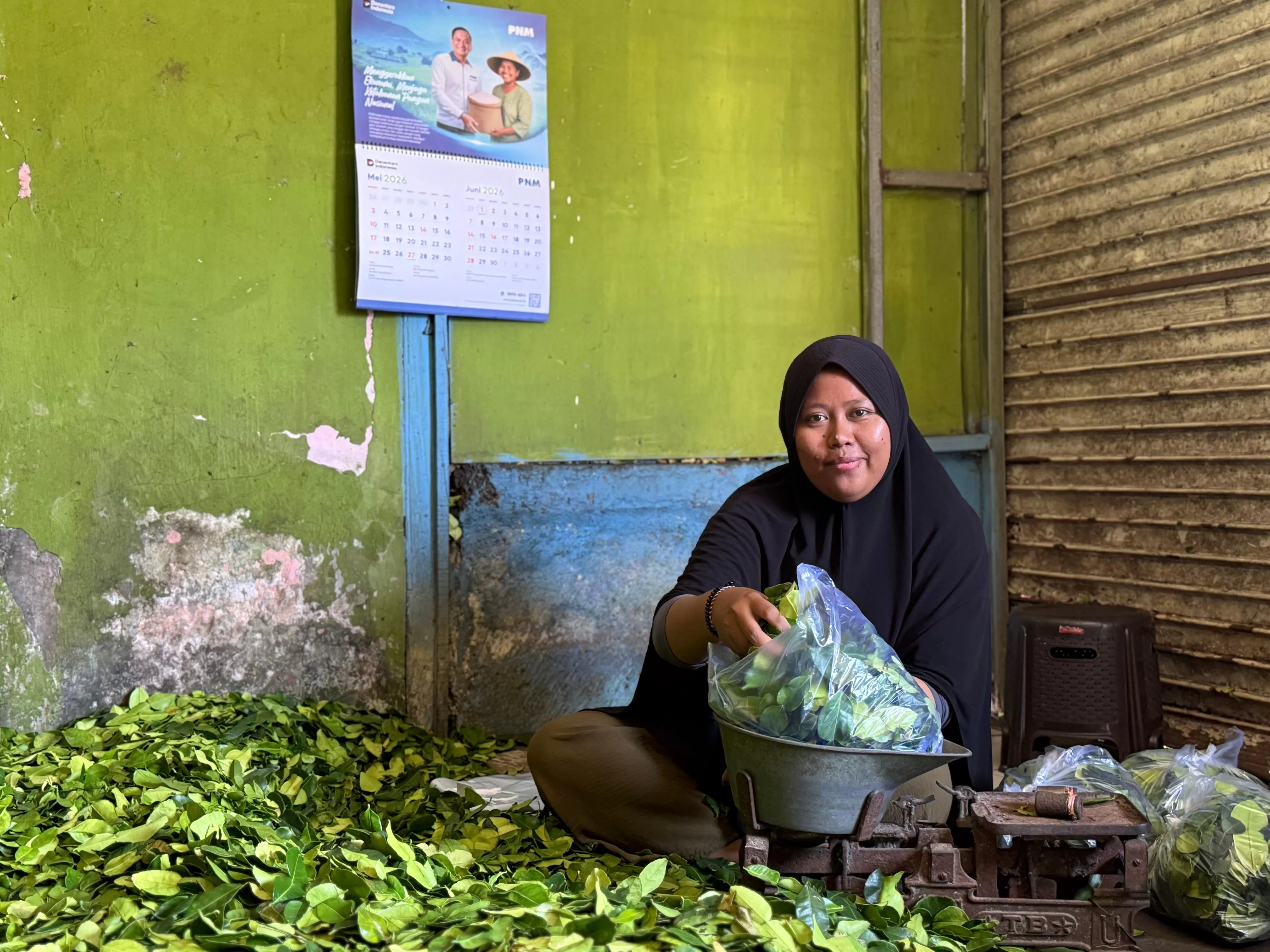Kisah Ibu Wulan di Denpasar menunjukkan perjuangan dari keterbatasan hingga mandiri berkat usaha dan pendampingan PNM. (pnm.co.id)
