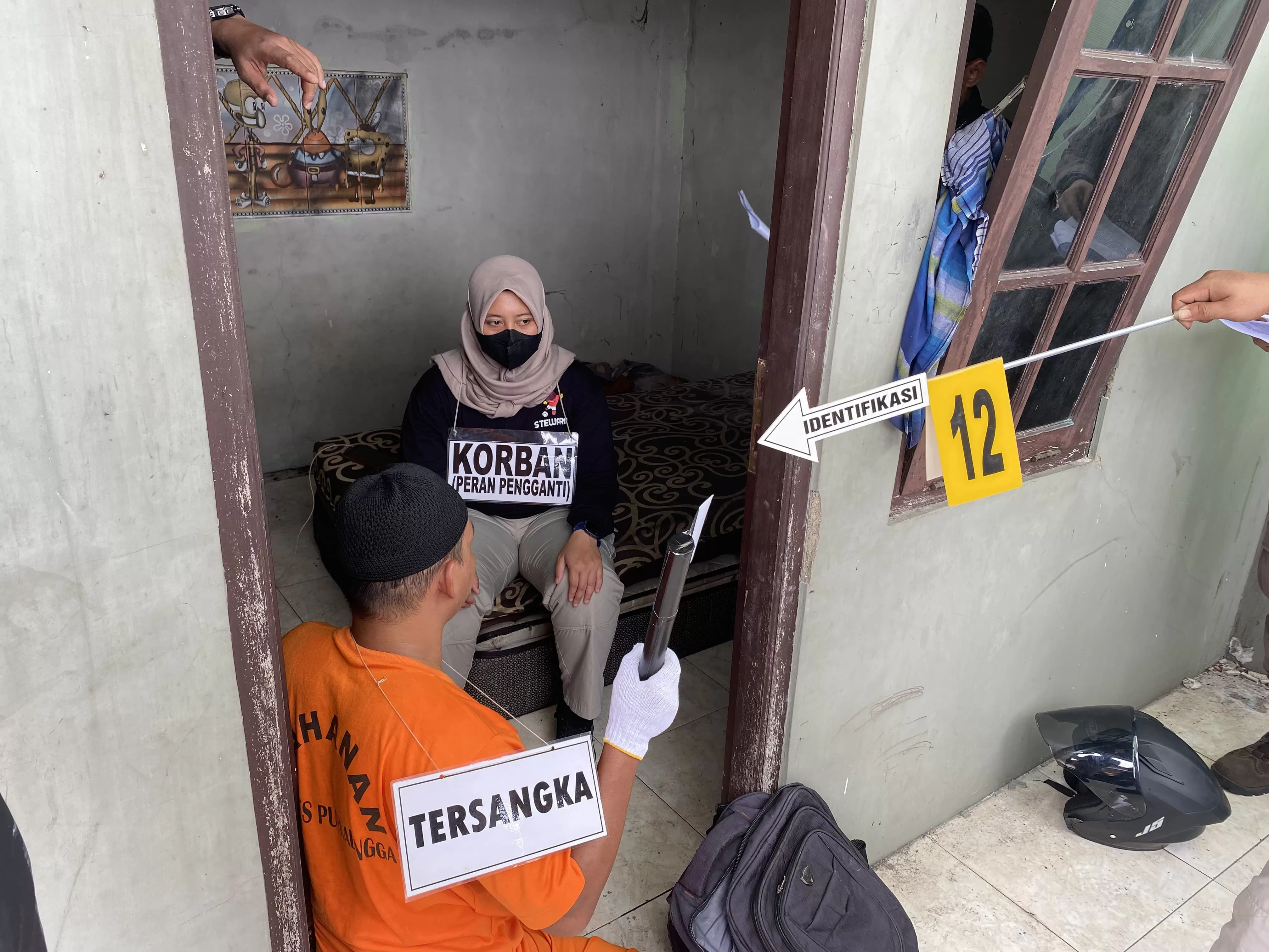 Rekonstruksi pembunuhan di Wirasana Putbalingga (TOTO R)