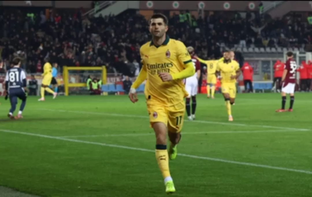 Christian Pulisic merayakan golnya ke gawang Torino ( (Foto: AC Milan). )