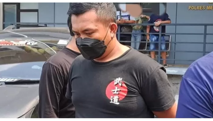 Tampang sopir taksi online tersangka penodongan dan pemerasan.  (Foto: Tangkap layar)