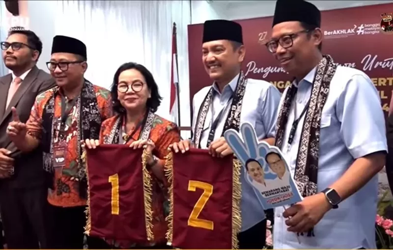 Potret pasangan calon pada Pilkada Kota Semarang 2024, menampilkan nomor urut. Agustina - Iswar 1, Yoyok - Joko 2. (Foto: YouTube/@kpukotasemarang)