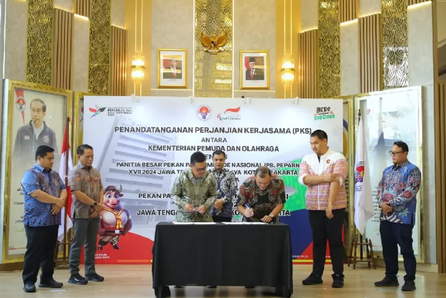 Potret penandatanganan perjanjian kerjasama bantuan pemerintah untuk dukungan penyelenggaraan Peparnas XVII 2024, Jumat (27/9/2024).  (Foto: Herry/kemenpora.go.id)