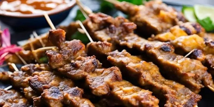 Sate jambing yang lezat dan menggugah selera (Canva / AI Ilustration)