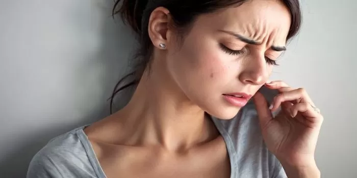 Seorang wanita yang tengah kesakitan karena sedang haid. (deepdreamgenerator.com / AI Generated)