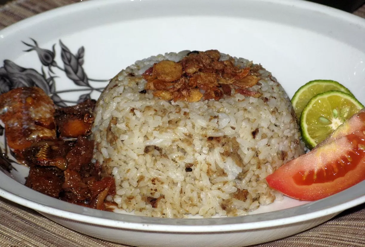 Resep membuat nasi tutug oncom (Wikipedia) (Puspitawati)